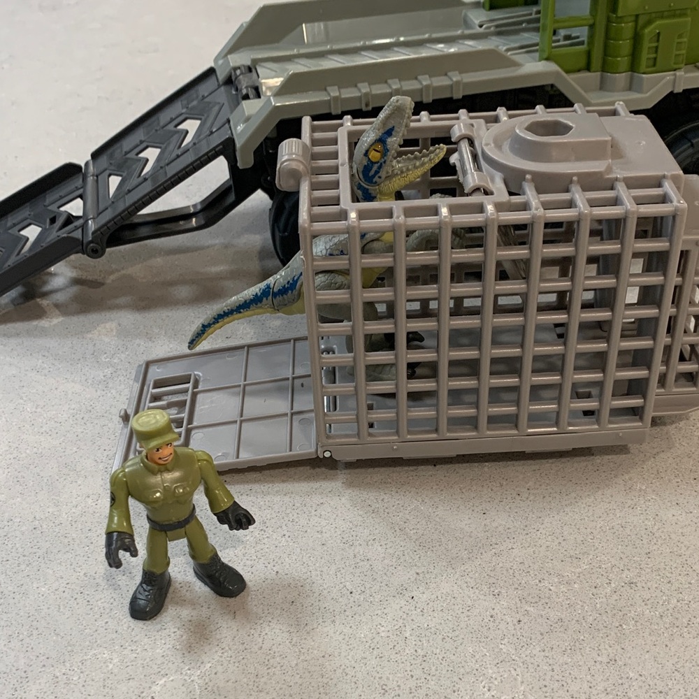 Fisher-Price Imaginext - Action Truck with Soldier and Dinosaur.